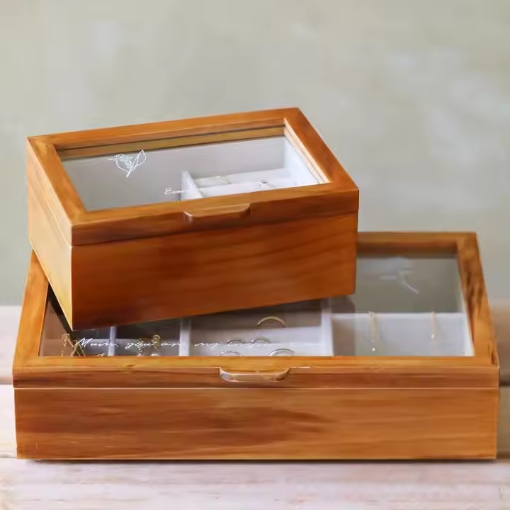 Compact wooden travel jewelry box with velvet compartments