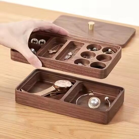 Compact wooden travel jewelry box with velvet compartments