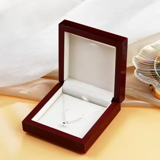 Custom wooden jewelry box with logo engraving and velvet interior
