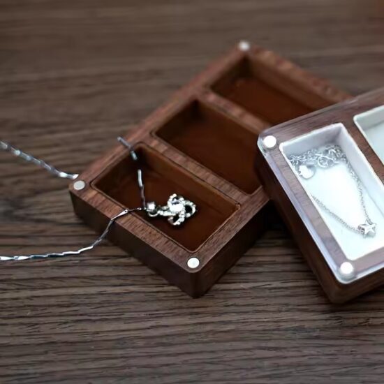Handmade walnut wood jewelry storage box with velvet interior