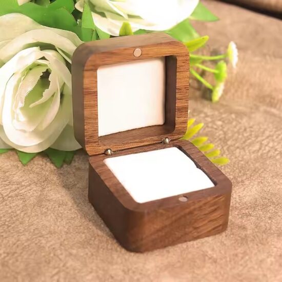 Handmade walnut wood jewelry storage box with velvet interior