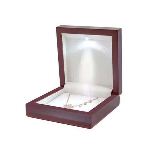 Luxury wooden jewelry box with high-gloss finish and velvet interior