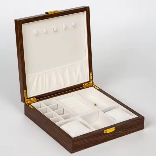 Handcrafted vintage wooden travel jewelry box with velvet interior