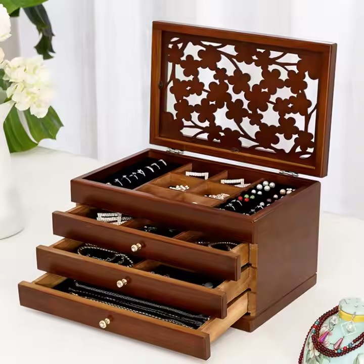 Handcrafted vintage wooden travel jewelry box with velvet interior