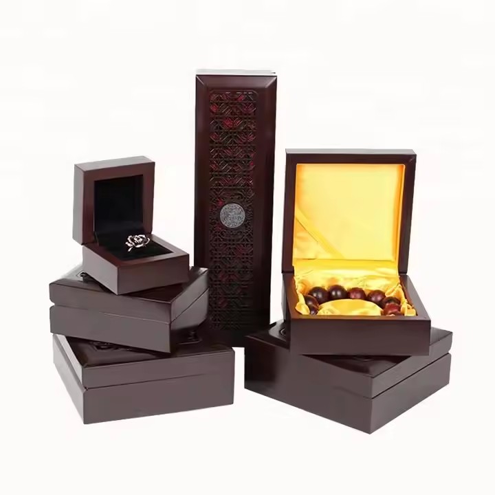 Custom wooden jewelry box with engraved logo on the lid
