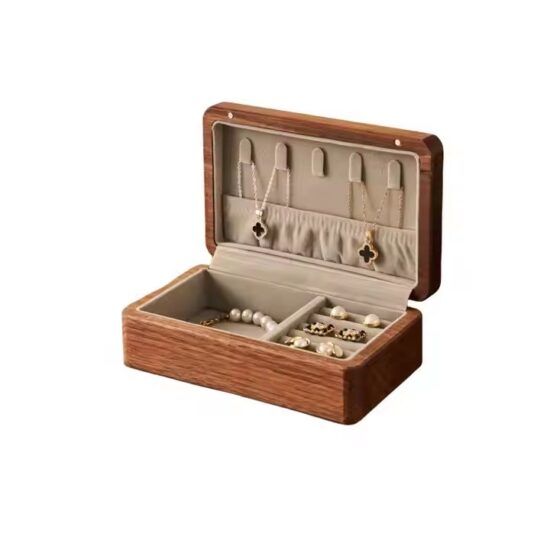 Vintage wooden jewelry box with antique clasp and velvet interior