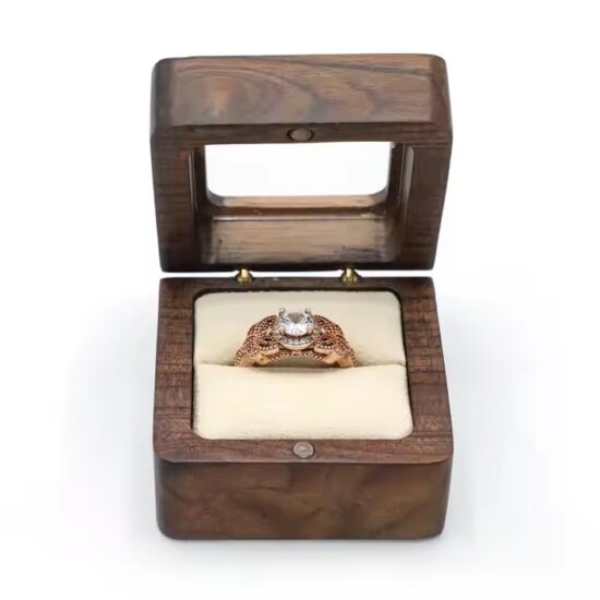 Vintage style wooden jewelry box with carved details and velvet interior

