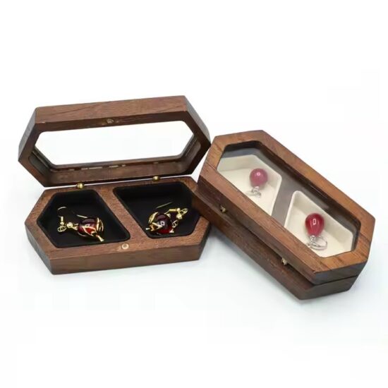 Vintage style wooden jewelry box with carved details and velvet interior

