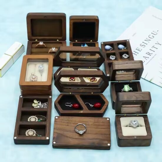 Vintage style wooden jewelry box with carved details and velvet interior

