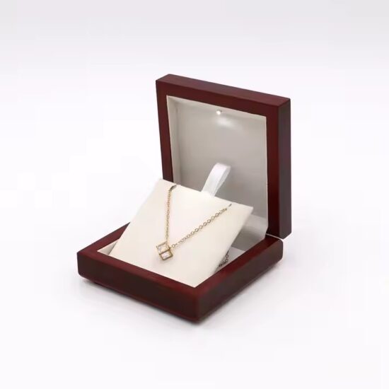 High-end wooden jewelry box with velvet interior and multiple compartments