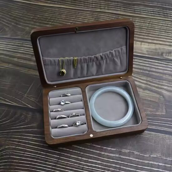 High-end wooden jewelry box with velvet interior and multiple compartments