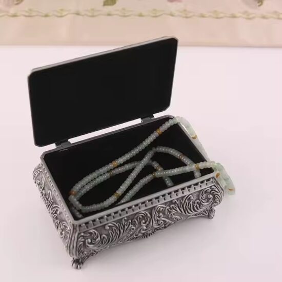 Vintage Metal Jewelry Box with Antique Finish and Ornate Details