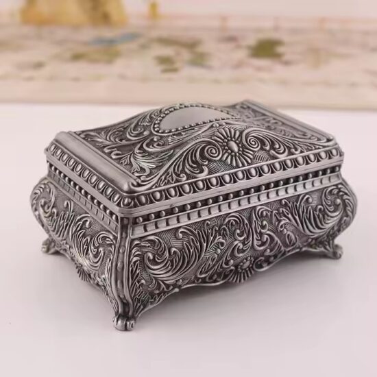 Vintage Metal Jewelry Box with Antique Finish and Ornate Details