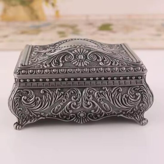 Vintage Metal Jewelry Box with Antique Finish and Ornate Details